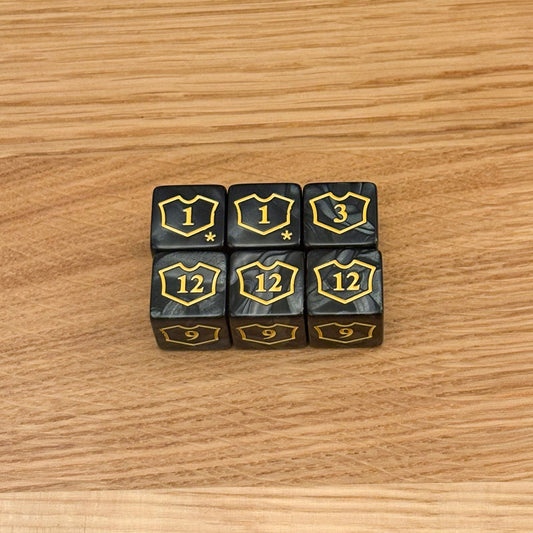 Six black loyalty counter dice with yellow shield icons, featuring numbers 1, 3, 9, and 12, designed for tracking loyalty.